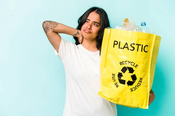 Young Hispanic Woman Recycling Plastic Isolated Yellow Background Touching Back — Stockfoto