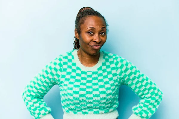 stock image Young african american woman isolated on blue background sad, serious face, feeling miserable and displeased.