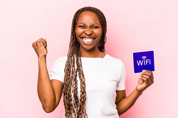 Young African American Woman Holding Eating Sign Isolated Blue Background — Stock Photo, Image