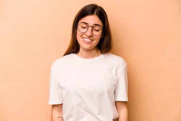 Young Hispanic Woman Isolated Beige Background Laughs Closes Eyes Feels — Stock Photo, Image