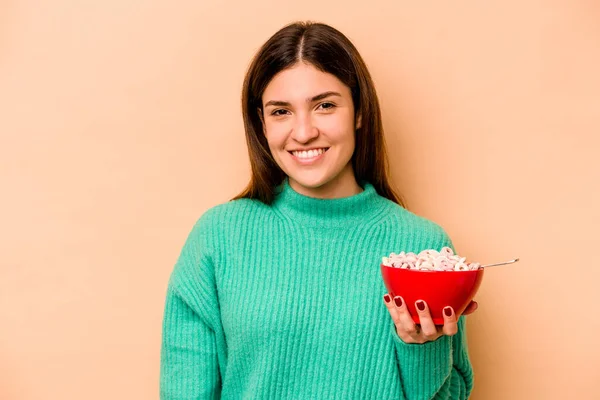 Young Hispanic Woman Eating Cereals Isolated Beige Background Happy Smiling — Stock Photo, Image