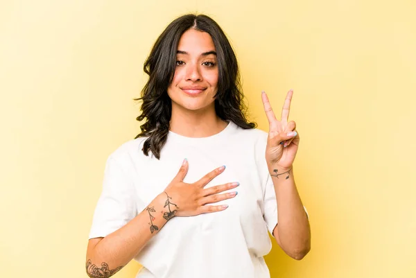 Young Hispanic Woman Isolated Yellow Background Taking Oath Putting Hand — Fotografie, imagine de stoc