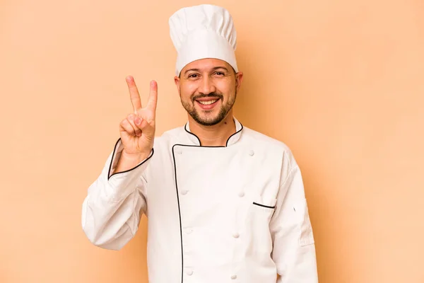 Hispanic Chef Man Isolated Beige Background Showing Number Two Fingers — Stockfoto