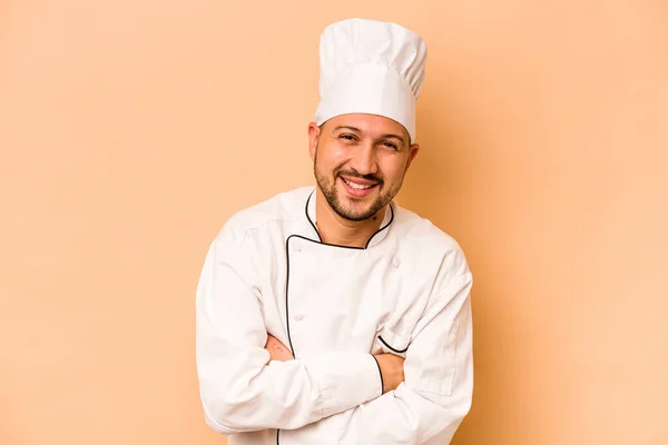 Hispanic Chef Man Isolated Beige Background Laughing Having Fun — Zdjęcie stockowe