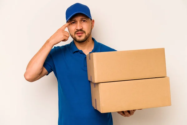 Hispanic Delivery Man Isolated White Background Showing Disappointment Gesture Forefinger — Stockfoto