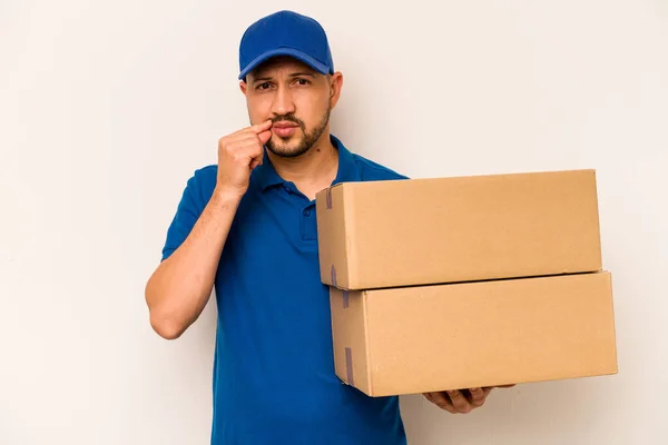 Hispanic Delivery Man Isolated White Background Fingers Lips Keeping Secret — Stock Photo, Image