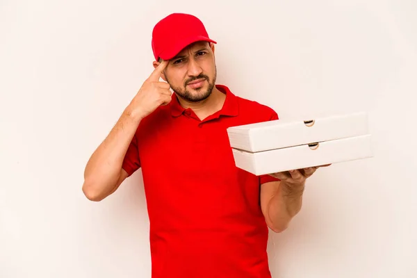 Jonge Bezorger Met Pizza Geïsoleerd Beige Achtergrond Met Een Teleurstellend — Stockfoto