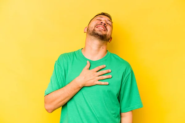 Young Hispanic Man Isolated Yellow Background Laughs Out Loudly Keeping — Stock Photo, Image