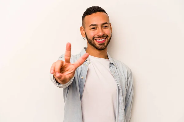 Young Hispanic Man Isolated White Background Joyful Carefree Showing Peace — 스톡 사진