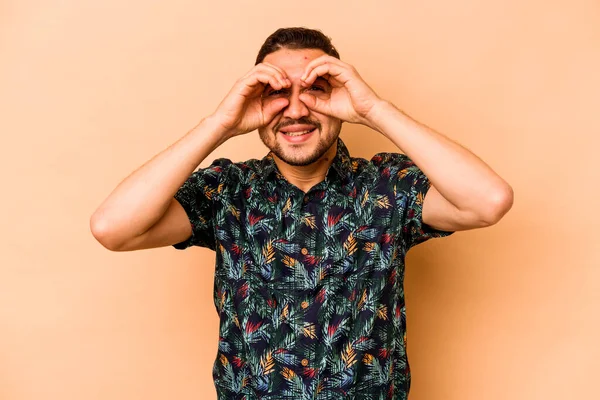 Young Hispanic Man Isolated Beige Background Showing Okay Sign Eyes — Stock Photo, Image