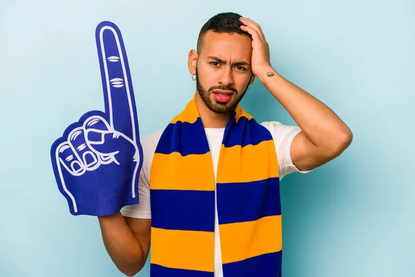 Young Sports Hispanic Fan Man Isolated Blue Background Being Shocked — Stock Photo, Image