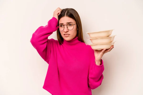 Young Caucasian Woman Holding Tupperware Isolated White Background Being Shocked — Stock Photo, Image
