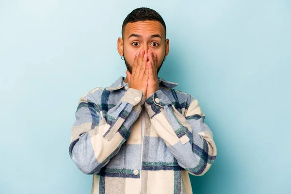 Young Hispanic Man Isolated Blue Background Shocked Covering Mouth Hands — 스톡 사진
