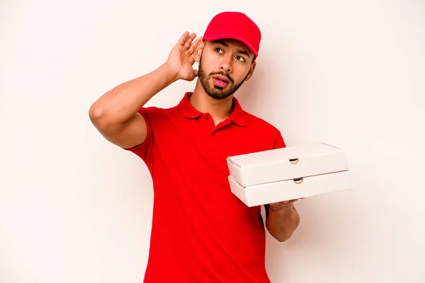 Young Hispanic Delivery Man Holding Pizzas Isolated White Background Trying — Stockfoto