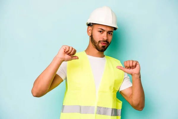 Young Laborer Hispanic Man Isolated Blue Background Feels Proud Self — 스톡 사진