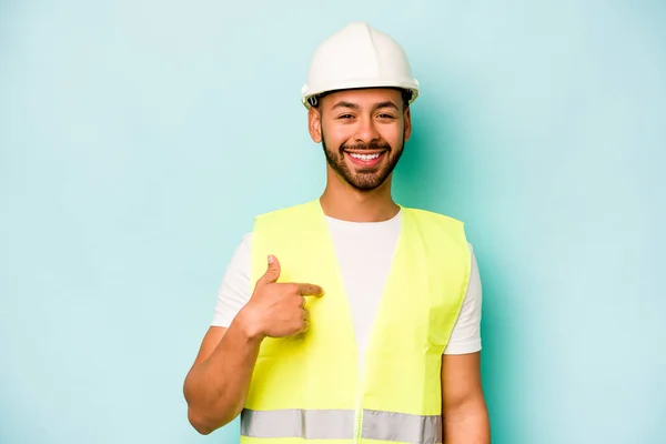 Young Laborer Hispanic Man Isolated Blue Background Person Pointing Hand — Stock Photo, Image