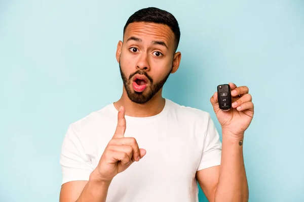 Young Hispanic Man Holding Car Keys Isolated Blue Background Having — Fotografia de Stock