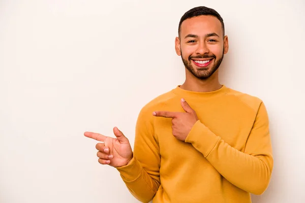 Young Hispanic Man Isolated White Background Excited Pointing Forefingers Away — 스톡 사진