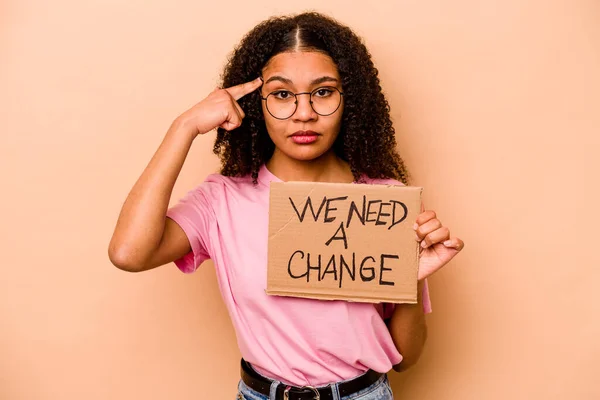 Young African American Woman Holding Need Change Placard Isolated Beige — Stok fotoğraf