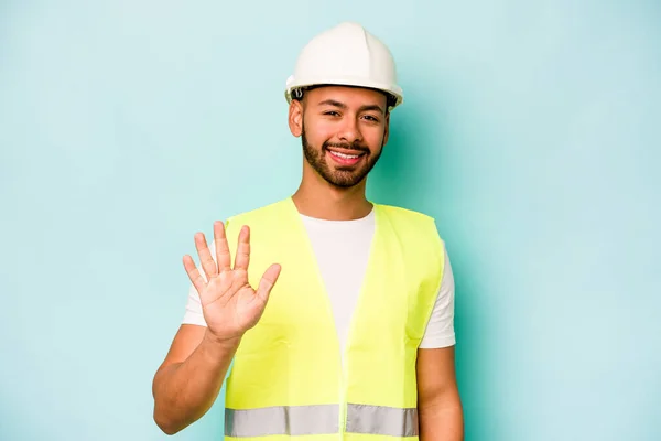 Young Laborer Hispanic Man Isolated Blue Background Smiling Cheerful Showing — 스톡 사진
