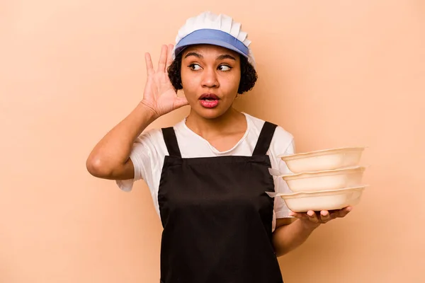 Young Cook Volunteer African American Woman Isolated Beige Background Trying — Fotografia de Stock