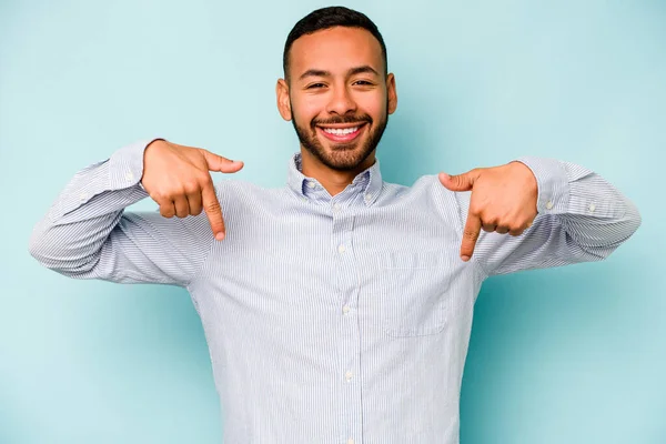 Young Hispanic Man Isolated Blue Background Points Fingers Positive Feeling — ストック写真