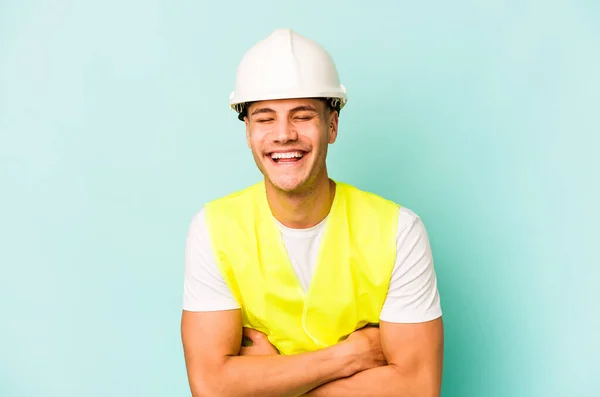 Young Laborer Caucasian Man Isolated Blue Background Laughing Having Fun — 스톡 사진