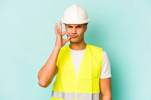 Young Laborer Caucasian Man Isolated Blue Background Fingers Lips Keeping — 스톡 사진