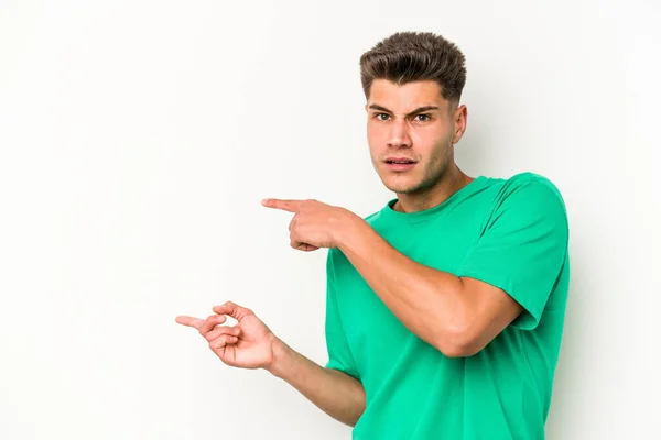 Young Caucasian Man Isolated White Background Shocked Pointing Index Fingers — Stock Photo, Image