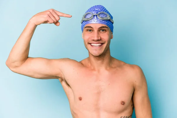 Young Caucasian Swimmer Man Isolated Blue Background — Foto Stock