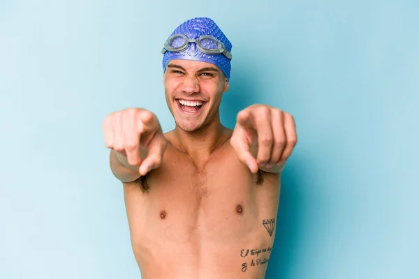 Young Caucasian Swimmer Man Isolated Blue Background — Zdjęcie stockowe