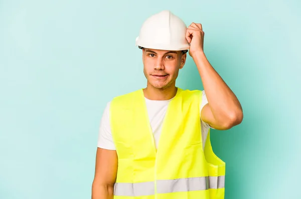 Young Laborer Caucasian Man Isolated Blue Background Being Shocked She — Stock Photo, Image