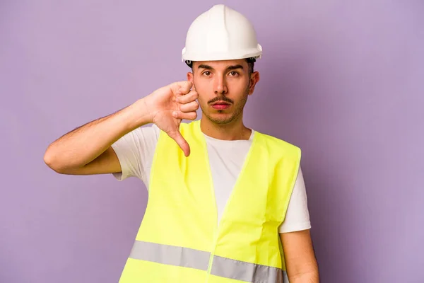 Young Hispanic Worker Man Isolated Purple Background Showing Dislike Gesture — Stock Photo, Image