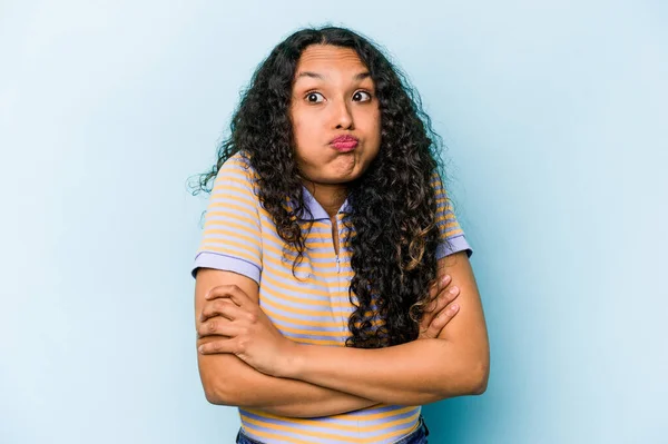 Young Hispanic Woman Isolated Blue Background Blows Cheeks Has Tired — Stock Photo, Image