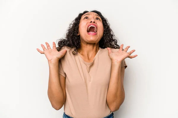 Young Hispanic Woman Isolated White Background Screaming Sky Looking Frustrated — стоковое фото