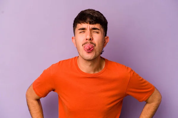 Young Caucasian Man Isolated Purple Background Funny Friendly Sticking Out — Stock Photo, Image