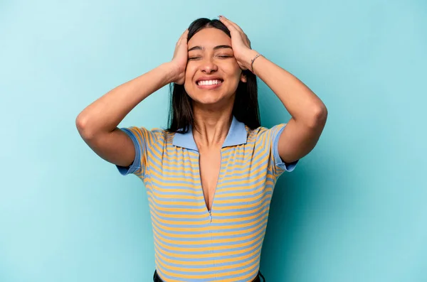 Young Hispanic Woman Isolated Blue Background Laughs Joyfully Keeping Hands — Stock Photo, Image