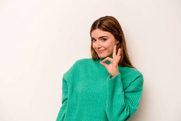 Young Caucasian Woman Isolated White Background Winks Eye Holds Okay — Stock Photo, Image