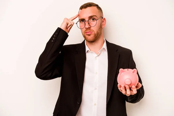 Jovem Homem Caucasiano Negócios Segurando Porquinho Banco Isolado Fundo Branco — Fotografia de Stock