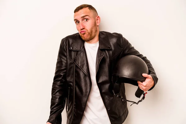Young Caucasian Man Motorcycle Helmet Isolated White Background Shrugs Shoulders — Stock Photo, Image