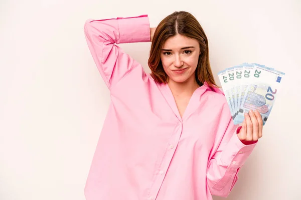 Young Woman Holding Banknotes Isolated White Background Touching Back Head — Stock Photo, Image