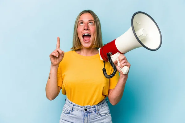 Young Caucasian Woman Holding Megaphone Isolated Blue Background Pointing Upside — Stockfoto