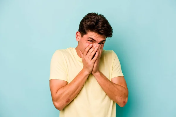 Young Caucasian Man Isolated Blue Background Laughing Something Covering Mouth — Stock Photo, Image