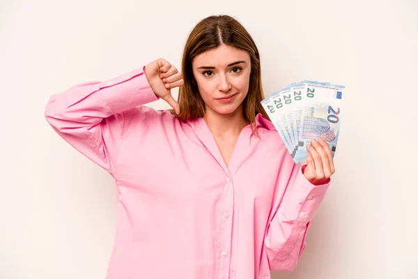 Young Woman Holding Banknotes Isolated White Background Showing Dislike Gesture — Stock Photo, Image