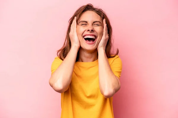 Young Caucasian Woman Isolated Pink Background Laughs Joyfully Keeping Hands — Stock Photo, Image