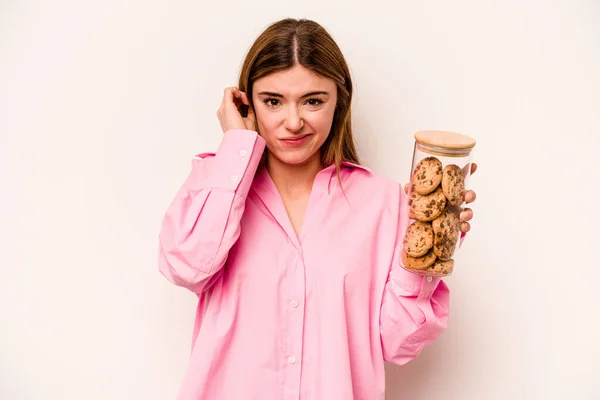 Молода Біла Жінка Тримає Банку Печива Ізольовані Білому Тлі Покриваючи — стокове фото