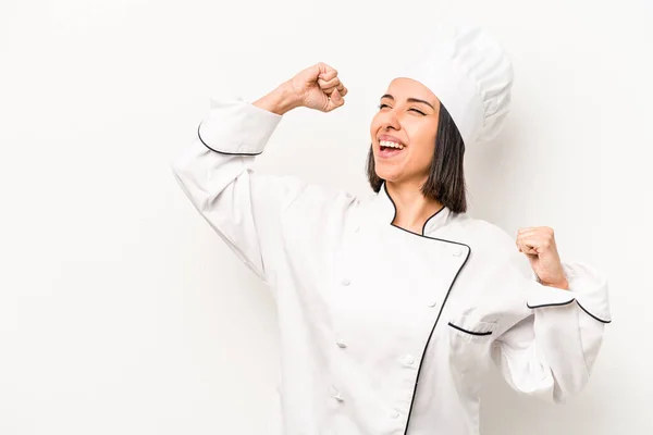 Young Hispanic Chef Woman Isolated White Background Raising Fist Victory — Stockfoto