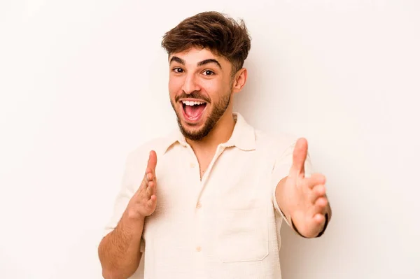 Young Hispanic Man Isolated White Background Feels Confident Giving Hug — Stock Photo, Image