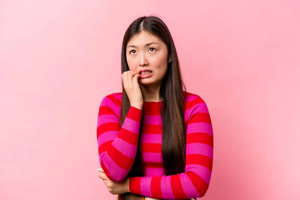 Young Chinese Woman Isolated Pink Background Biting Fingernails Nervous Very — Stock Photo, Image