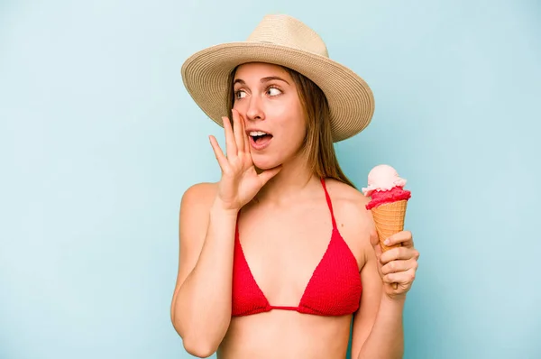 Young Caucasian Woman Wearing Bikini Holding Ice Cream Isolated Blue — Stock Photo, Image